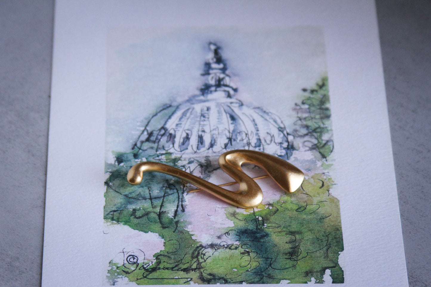 Carolee Gold Tone Swirl Brooch