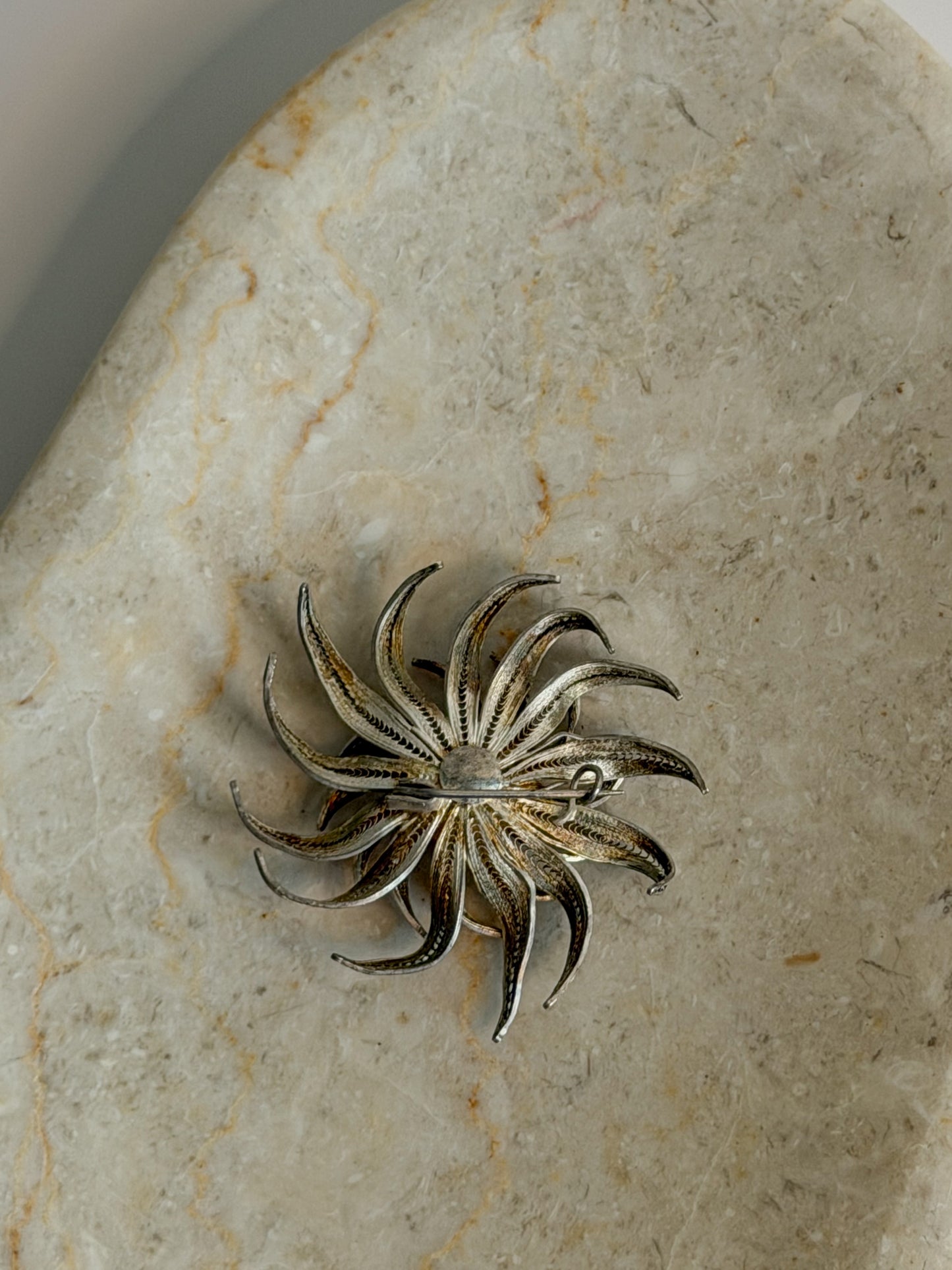 Silver-Tone Sculptural Sunburst Brooch