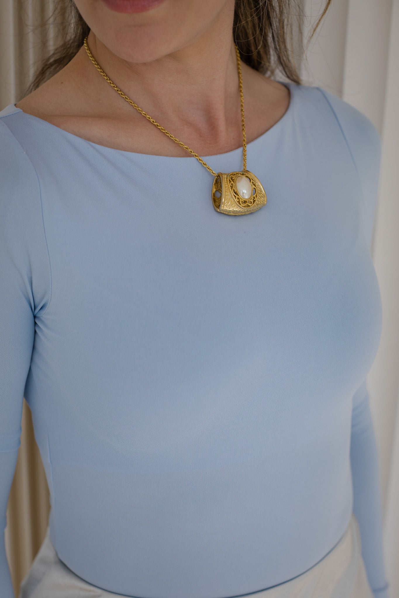 Gold-Tone Architectural Pendant Necklace with Faux Pearl Accent