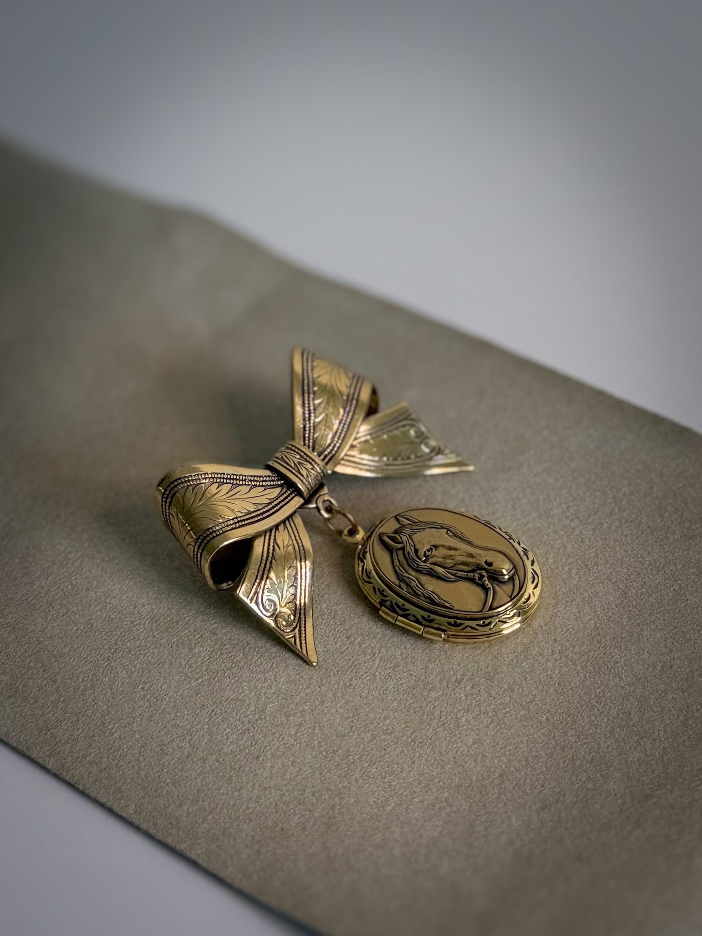Gold-Tone Bow & Horse Locket Brooch
