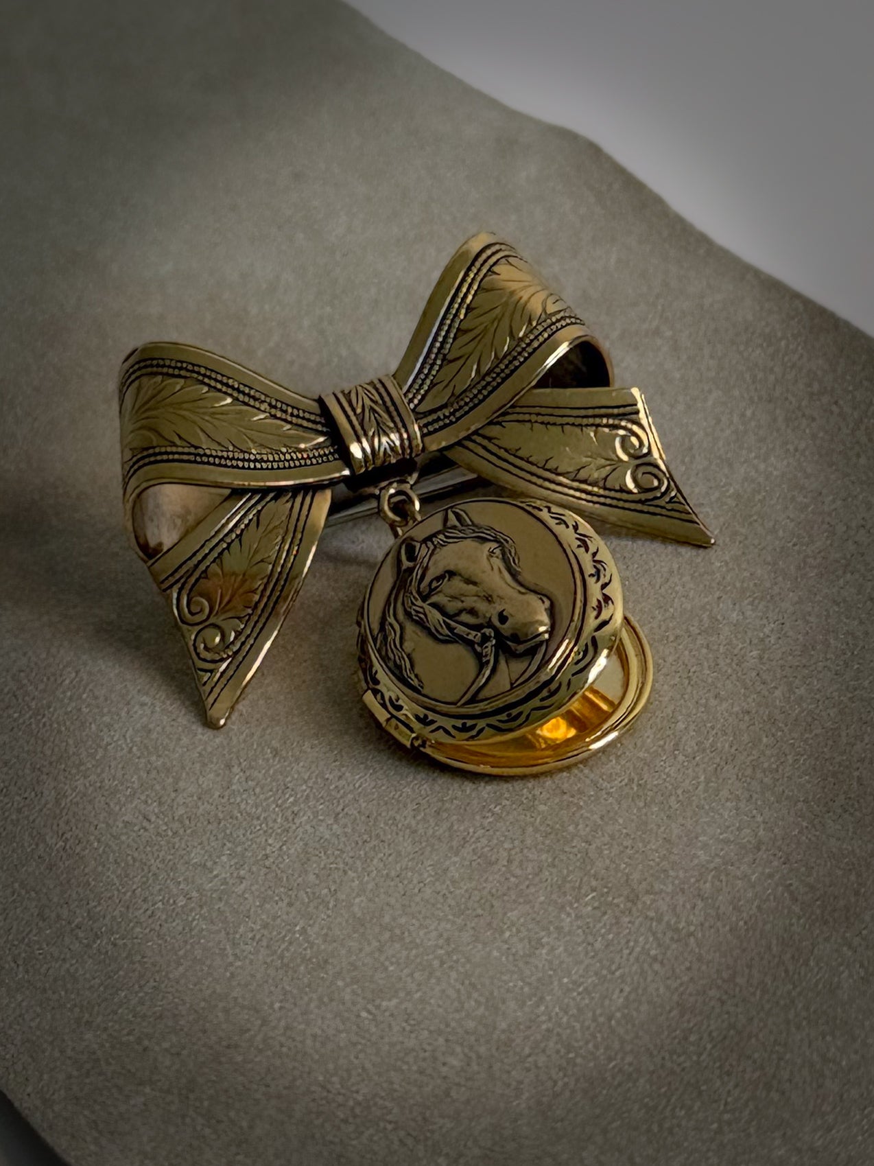 Gold-Tone Bow & Horse Locket Brooch