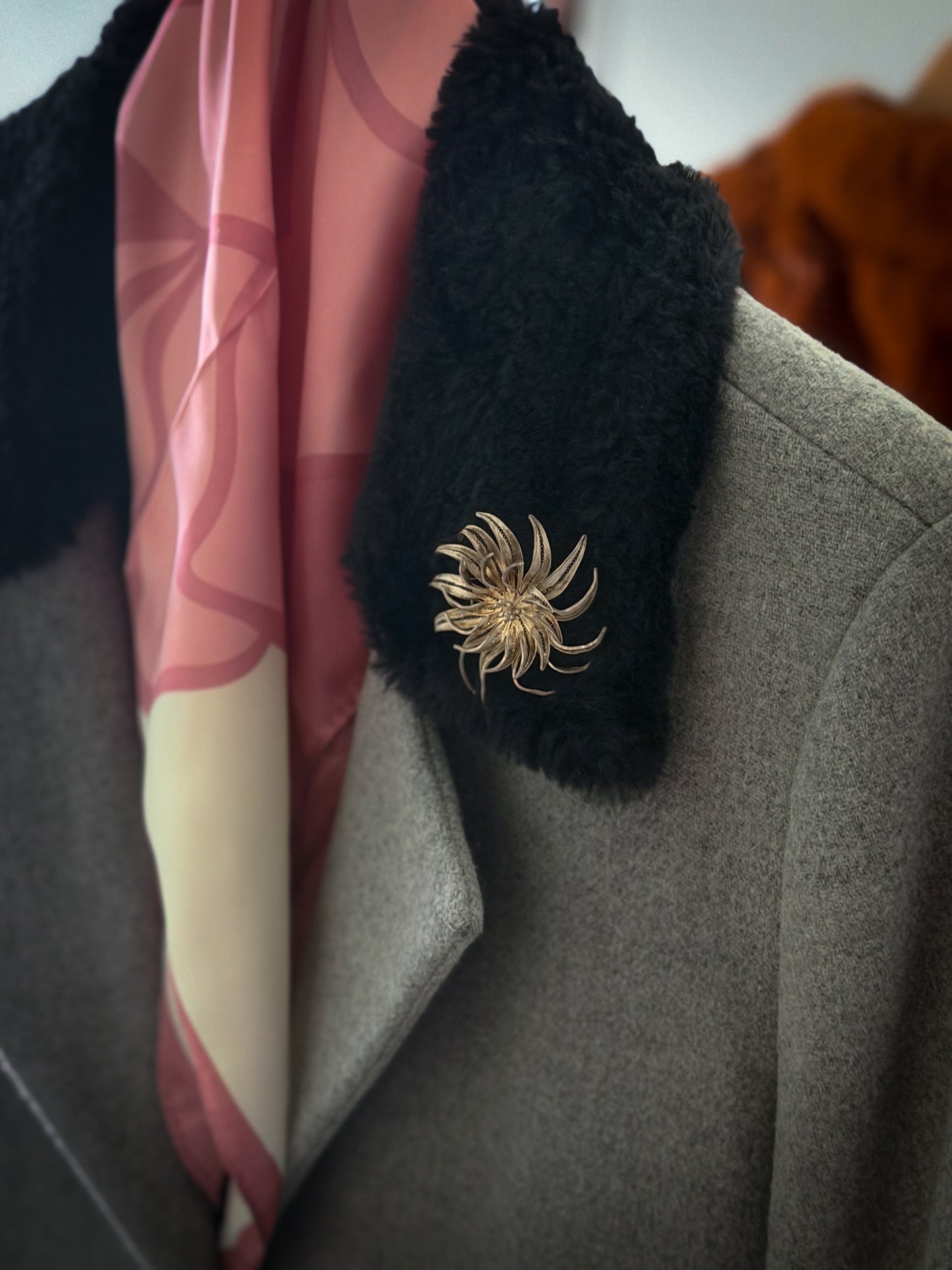 Silver-Tone Sculptural Sunburst Brooch